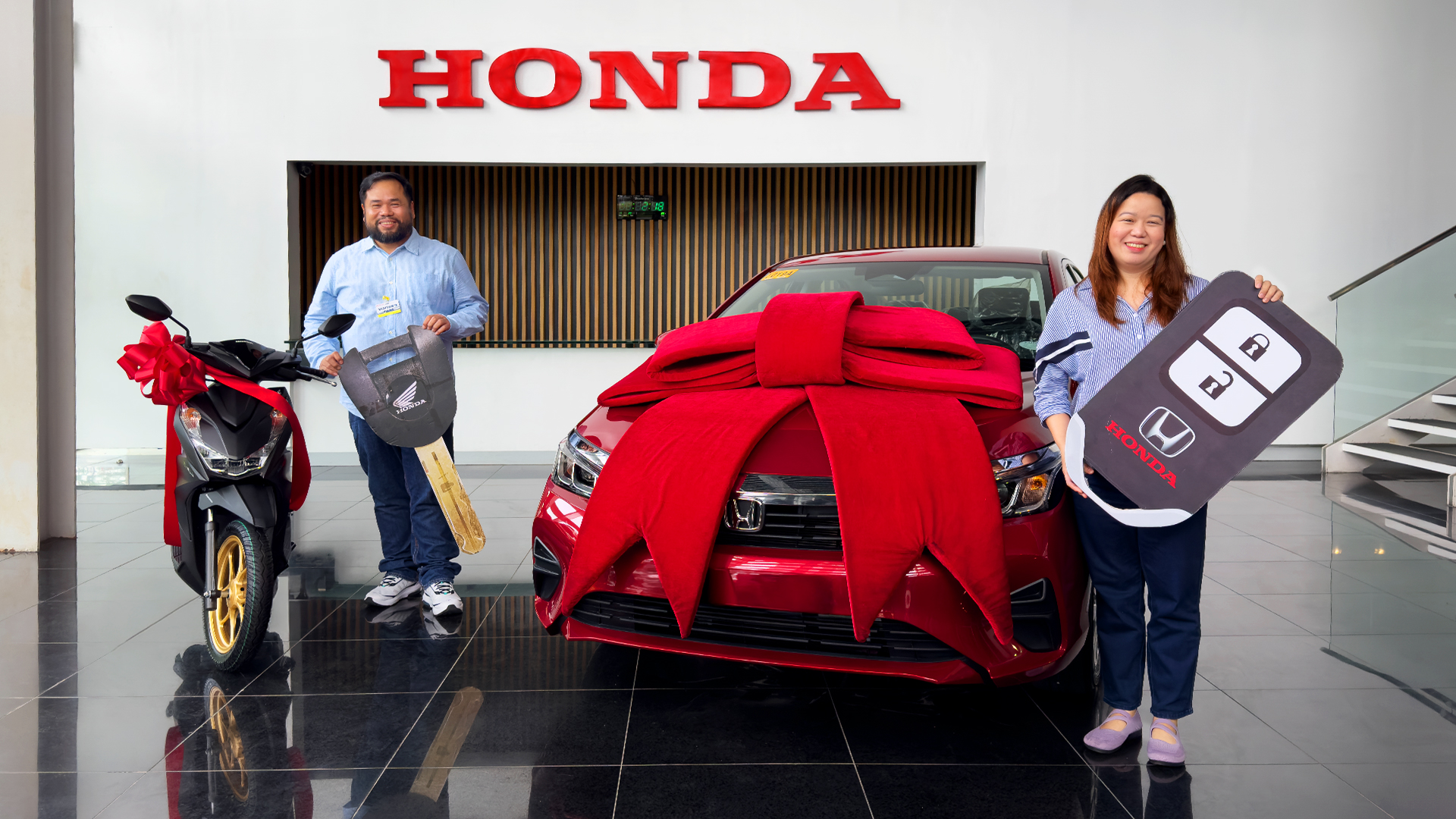Honda cars philippines awards two lucky winners from honda connect download and win raffle support photo